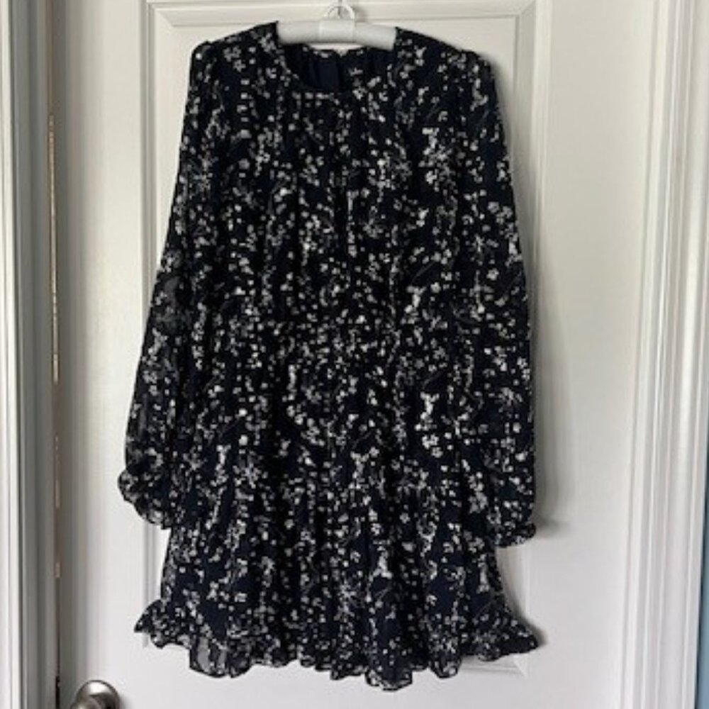 Lulus navy blue floral smocked mini dress with ruffled hem & cuffs. Size small